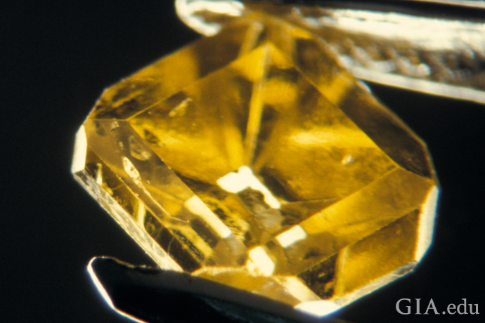 Brownish yellow synthetic diamond produced by General Electric.