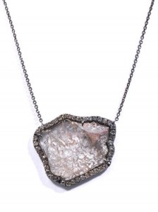 A diamond slice hangs from an 18ct blackened white gold chain. Designer Susan Foster calls this slate-grey diamond slice design an “opulent finishing touch” for evening wear.