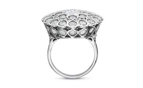 A Platinum Empress Ring with an intricate, lattice-patterned setting adorned with diamonds.