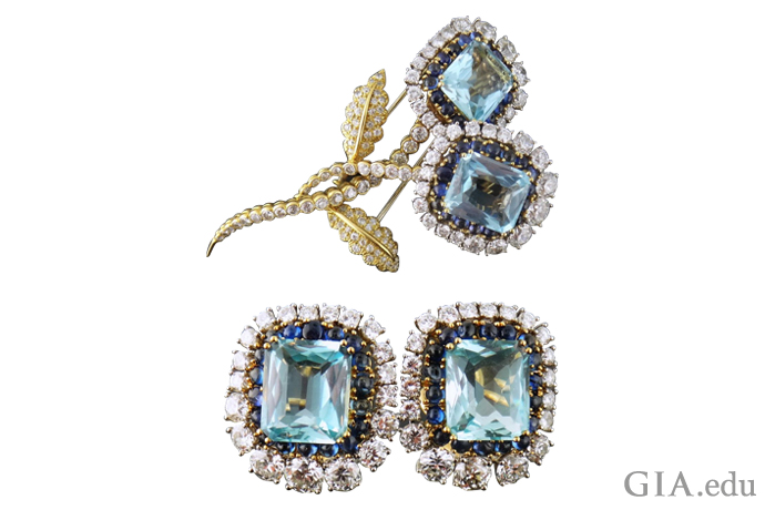 18K gold, platinum, aquamarine, diamond and sapphire flower brooch designed by David Webb