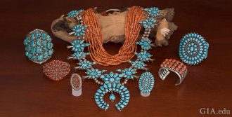 A collection of Native American Jewelry comprised of turquoise, coral, and silver.