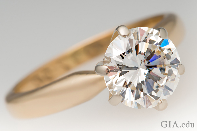 A 1.52 carat (ct) round brilliant diamond engagement ring.