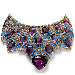 A luxurious amethyst bib necklace with an elaborate design incorporating various gemstones.