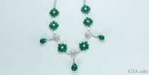 An emerald and diamond necklace totaling 41.97 carats