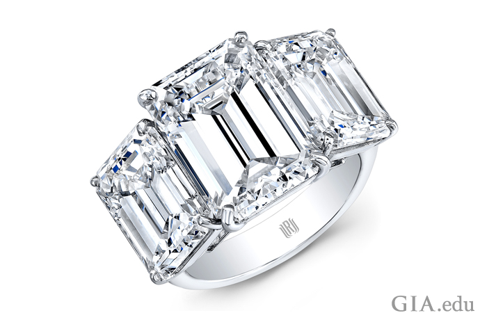 emerald cut engagement rings on finger