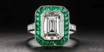 A 3.00 carat emerald cut diamond engagement ring.