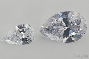 These pear shaped diamonds display a bow-tie effect, the dark area that extends across the width of each stone.