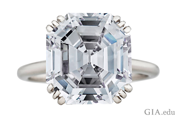 An 8.06 carat art deco diamond engagement ring, mounted in a 12-prong platinum setting. 