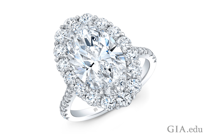 A 5.31 carat oval diamond engagement ring set in 18K white gold.