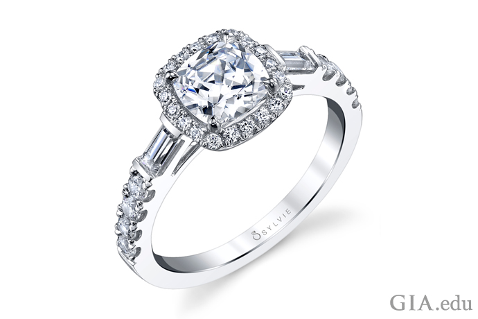 A cushion cut diamond engagement ring.