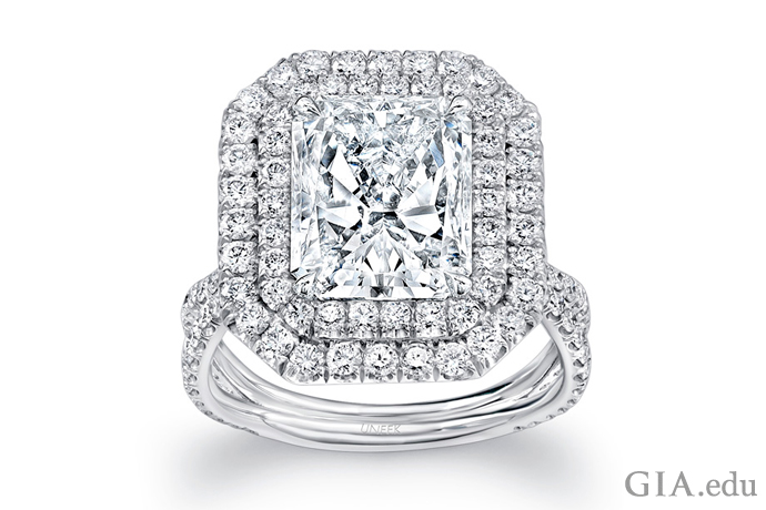 A 4.00 carat radiant cut diamond engagement ring wrapped with two diamond halos. 