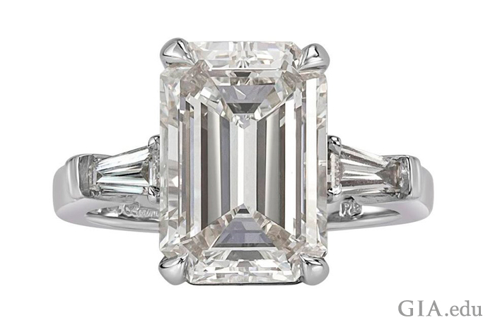 A 5.89 carat emerald cut diamond engagement ring. 