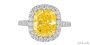 A 4.76 ct Fancy Vivid yellow diamond engagement ring with a halo of colorless diamonds.