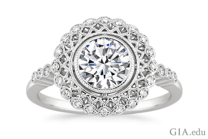 Edwardian style diamond engagement ring with milgrain and latticework detail.