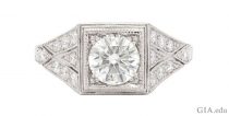 A 1.05 ct round brilliant cut diamond engagement ring set in an antique style.
