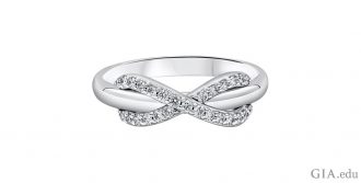 A diamond promise ring with an infinity band.