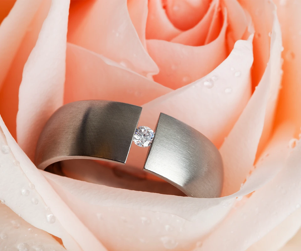 Tension set diamond ring.