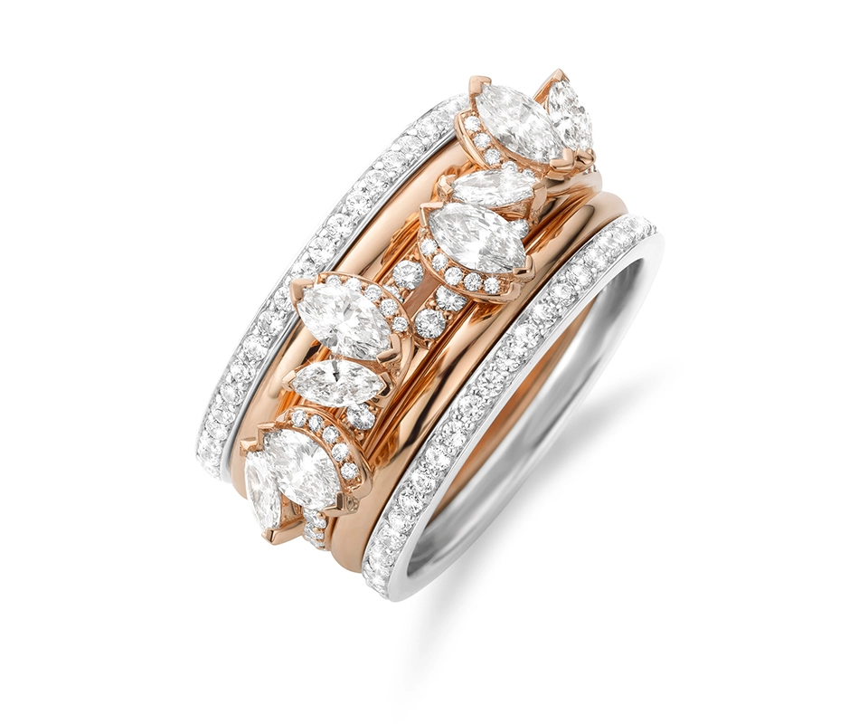 Rose gold and white gold ring stack with diamonds