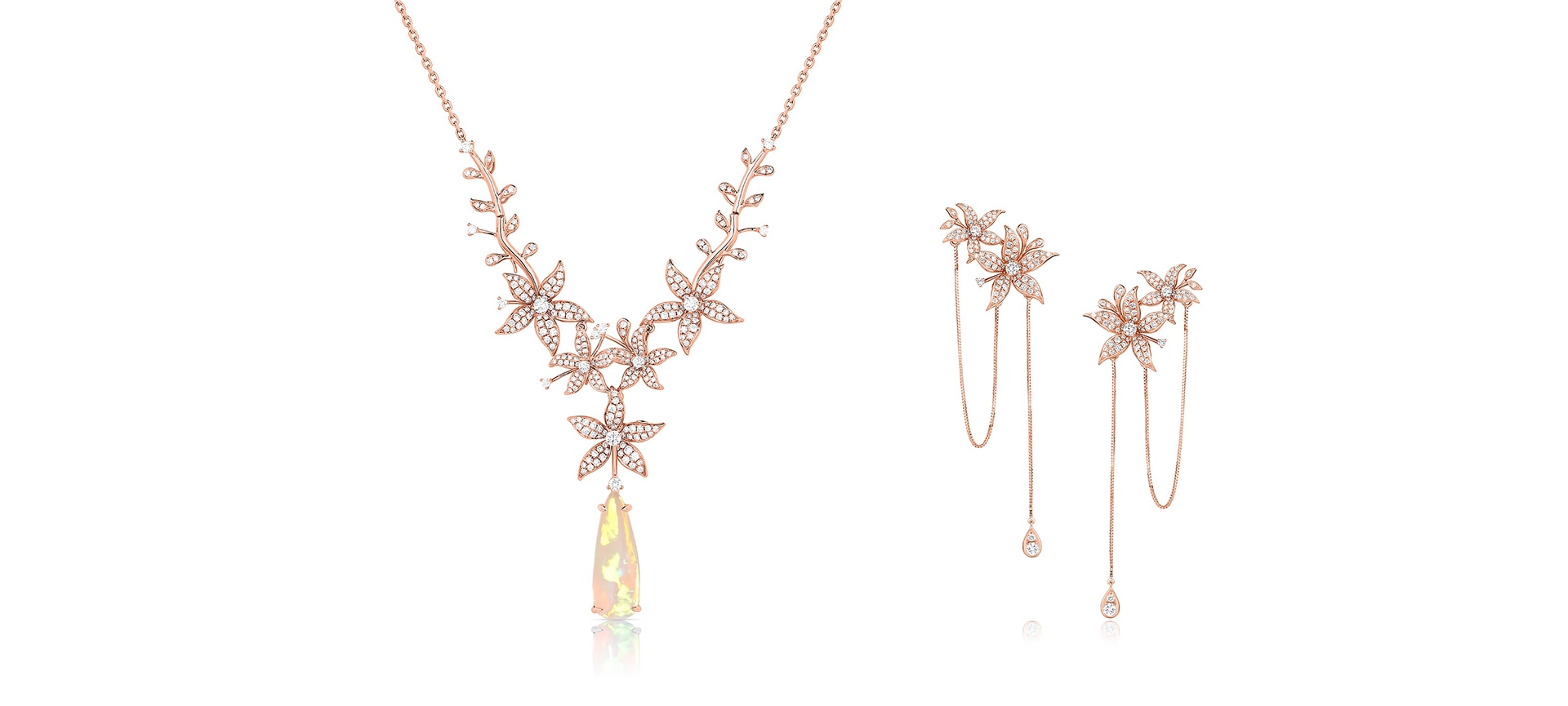 18K rose gold necklace and earring set.