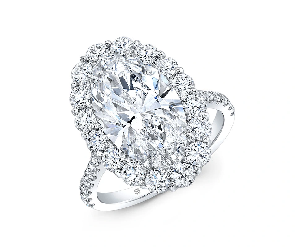 This 18K white gold ring is set with 5.31 carats of diamonds