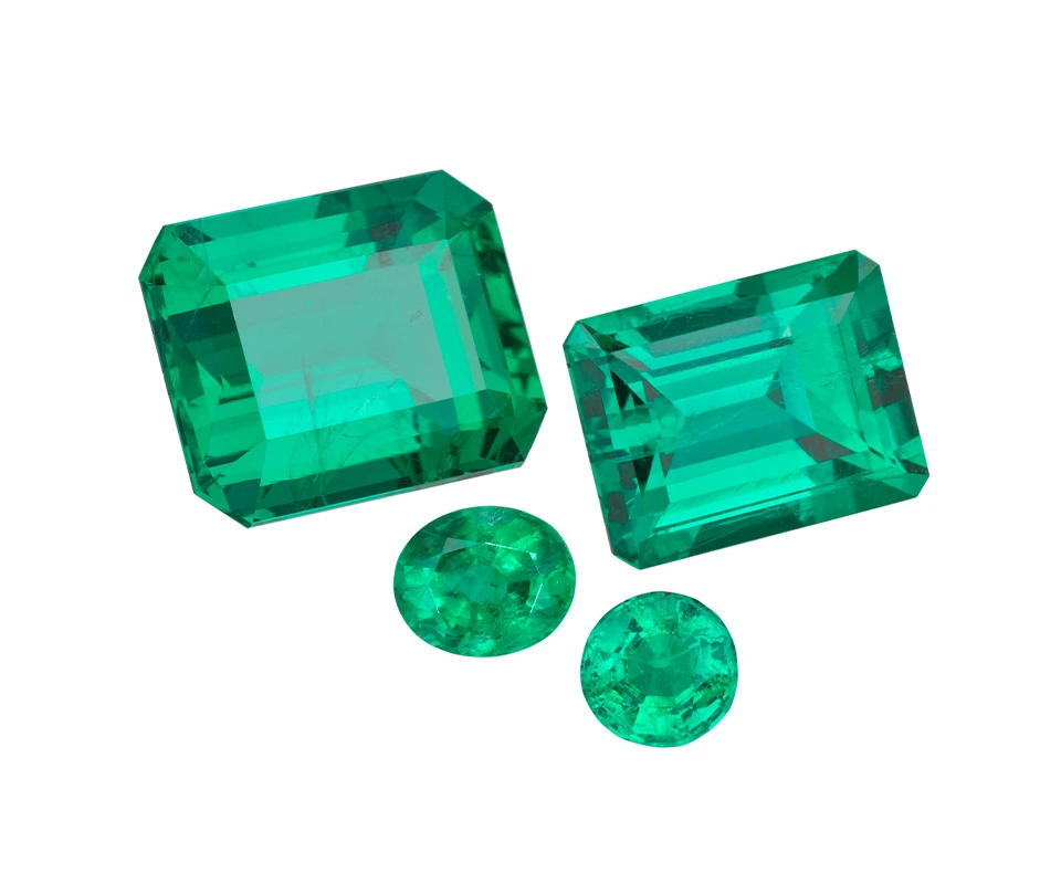 Four emeralds from Brazil and Colombia