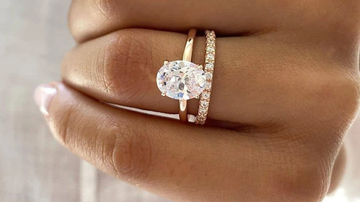 A diamond ring with small prongs.