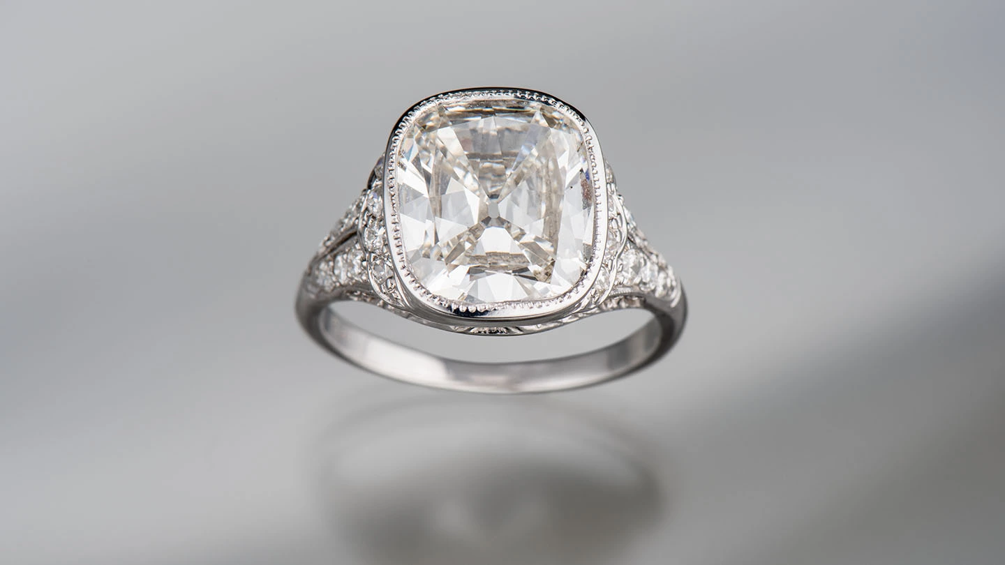 Edwardian old mine cut diamond ring on gray background
