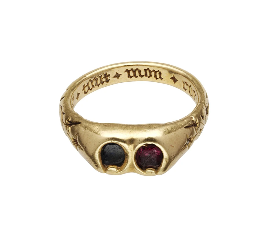 Medieval garnet engagement ring in toi et moi style