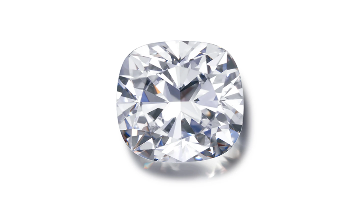 Cushion cut diamond on white background.