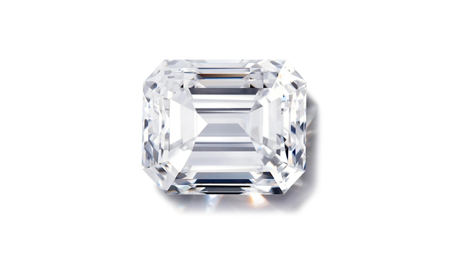Emerald cut diamond on white background.