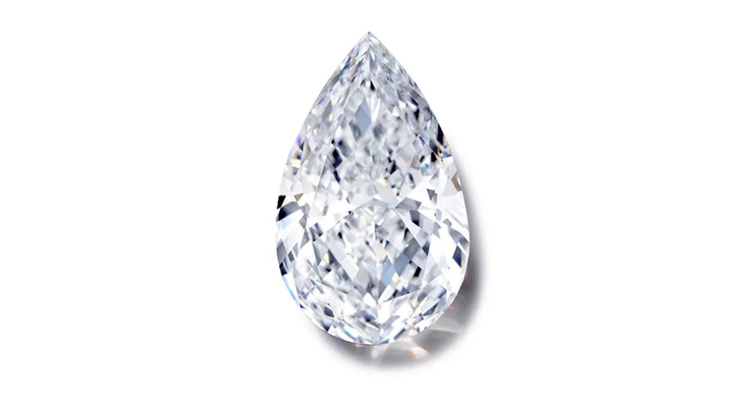 Pear brilliant cut diamond on white background.