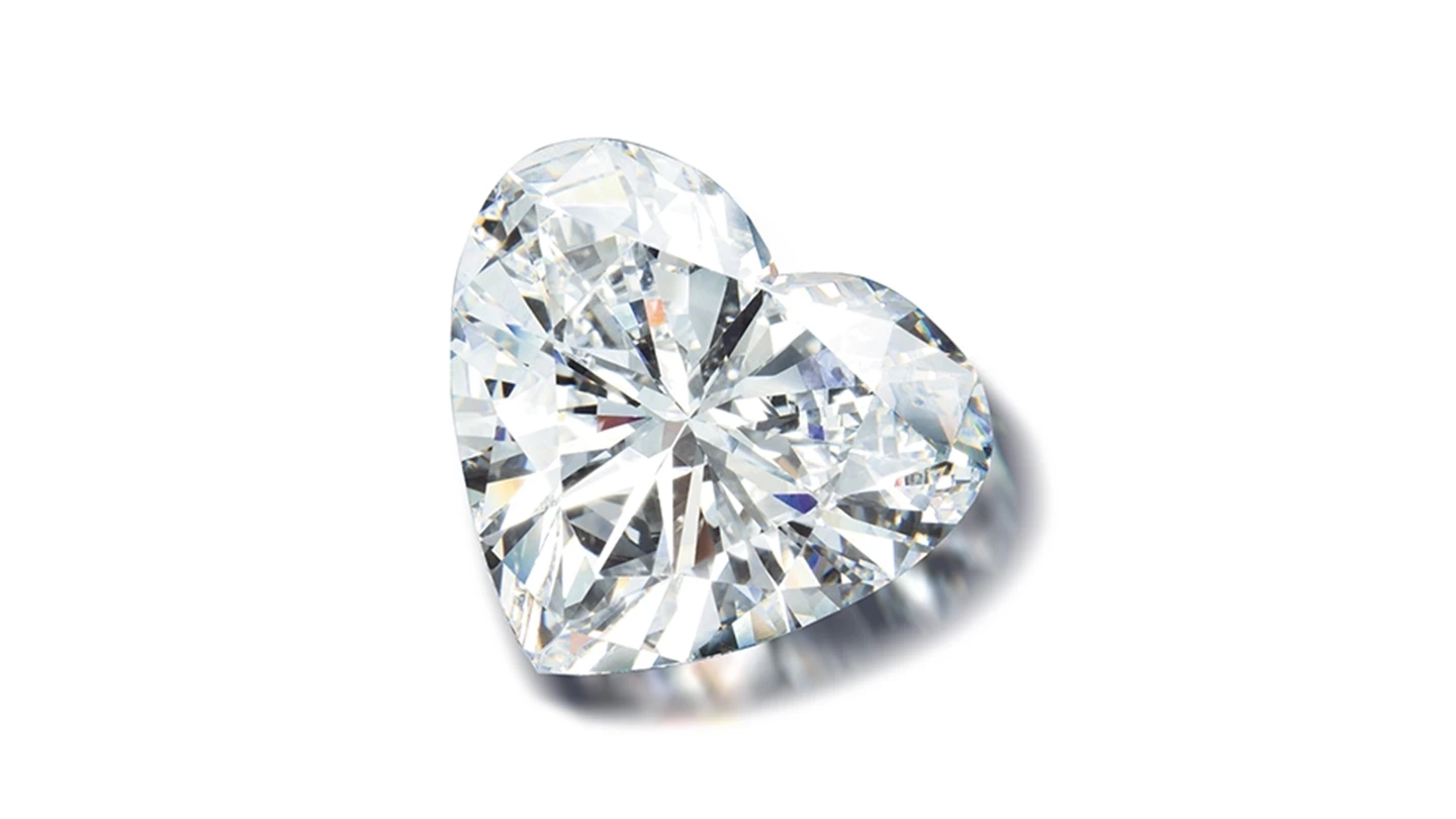 Heart-shaped diamond on white background.