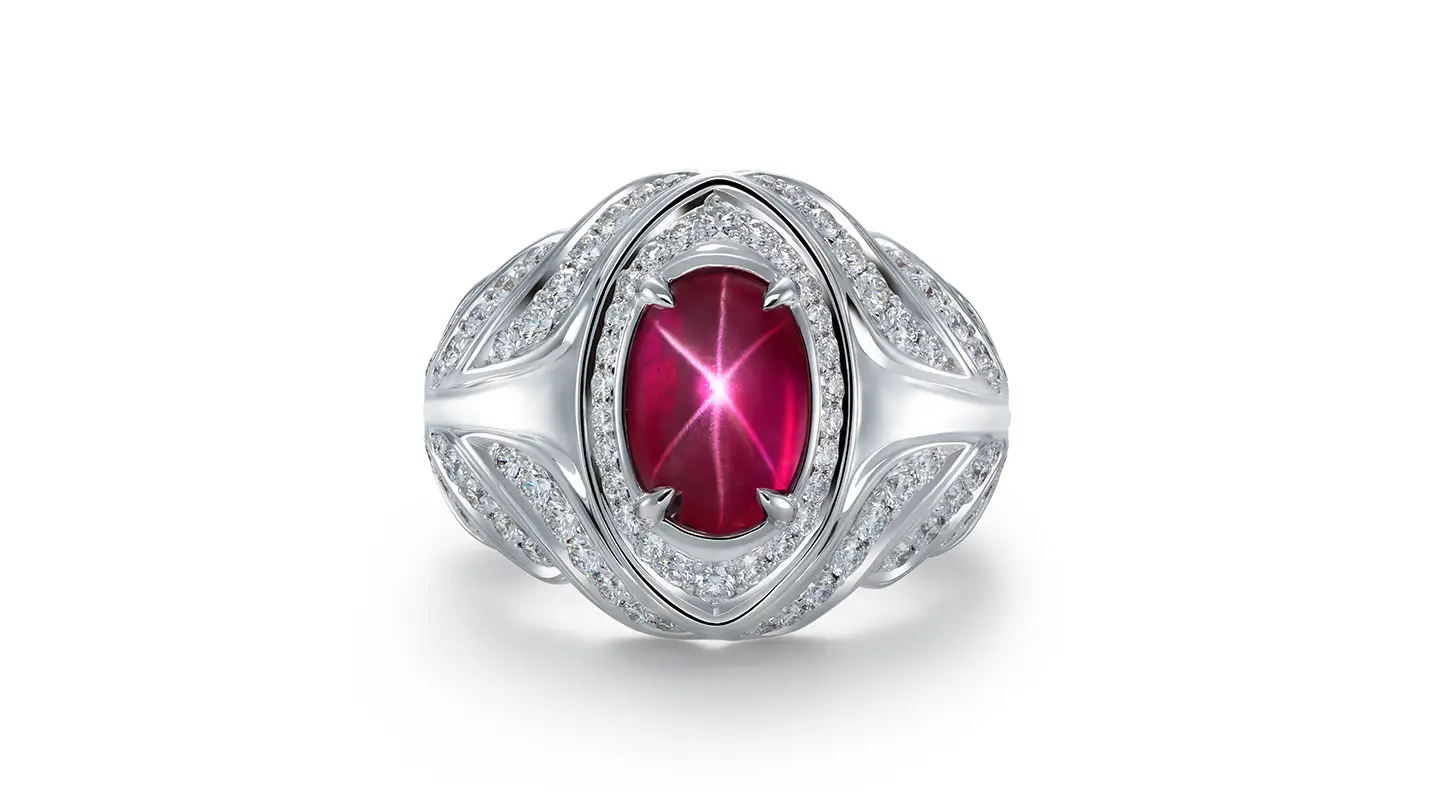 Burmese star ruby, diamond and white gold ring on white background