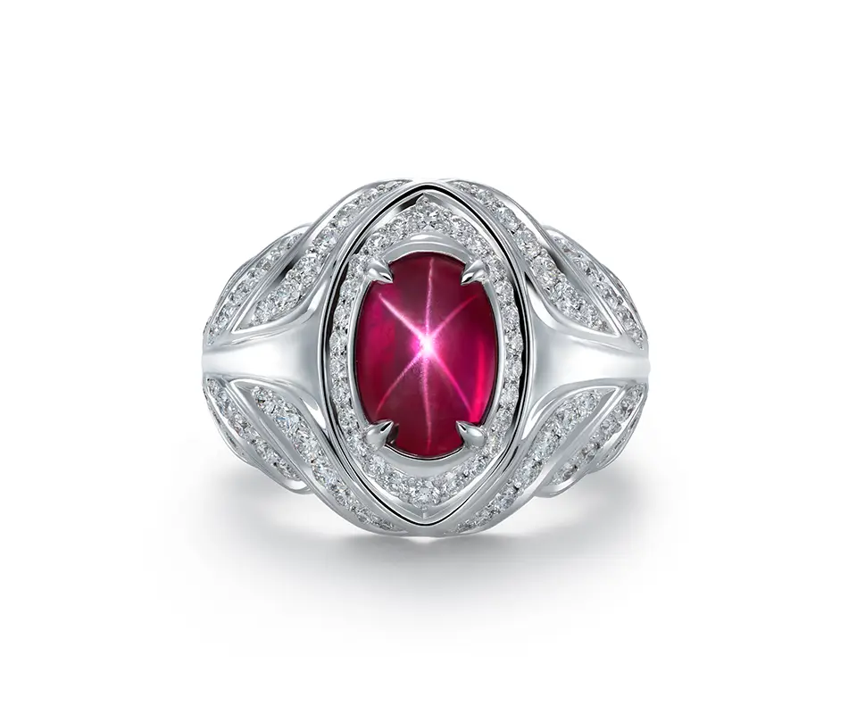 Burmese star ruby, diamond and white gold ring on white background