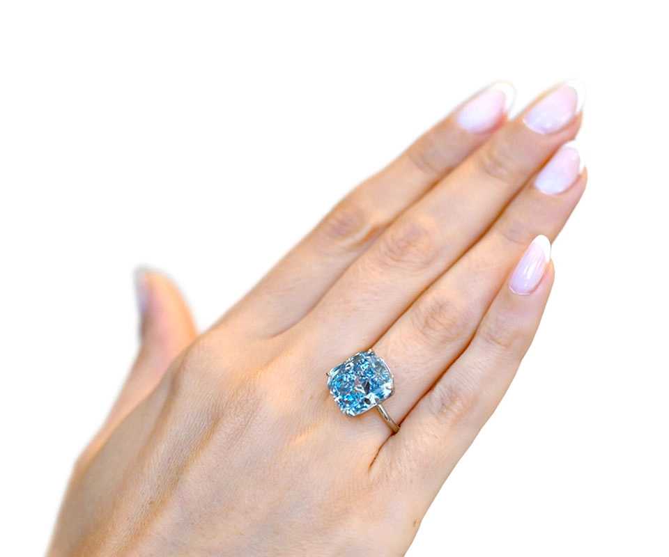 10-carat Mediterranean Blue, Fancy Vivid blue diamond ring on woman’s hand
