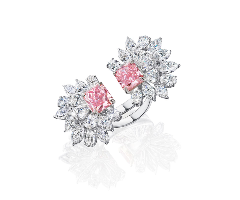 Open-style ring with two lab-grown pink diamonds surrounded by colorless diamonds resembling flower petals