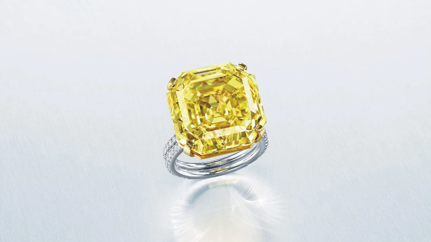 Square emerald cut fancy vivid yellow diamond ring