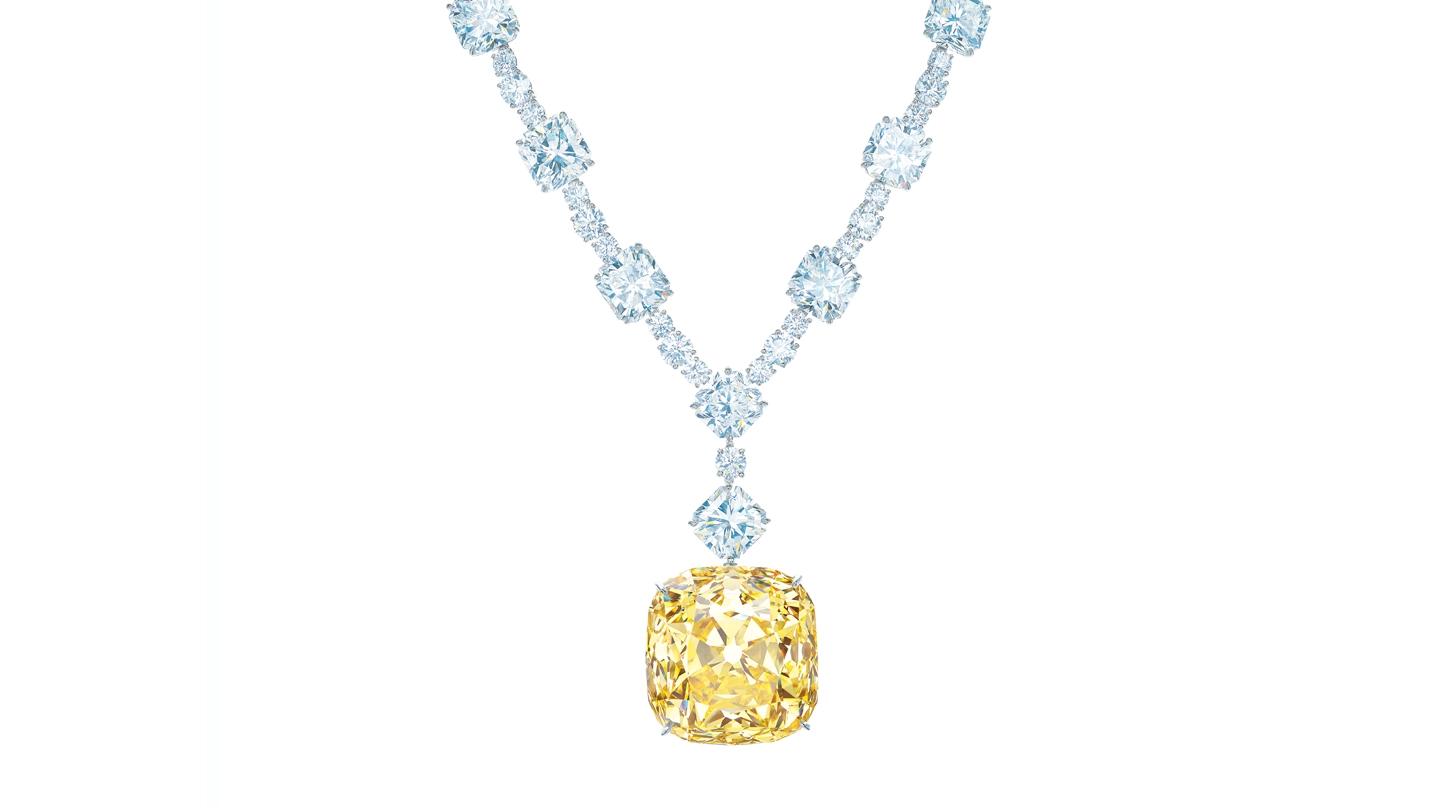The Tiffany Diamond, a famous Fancy Yellow diamond set, in a diamond necklace