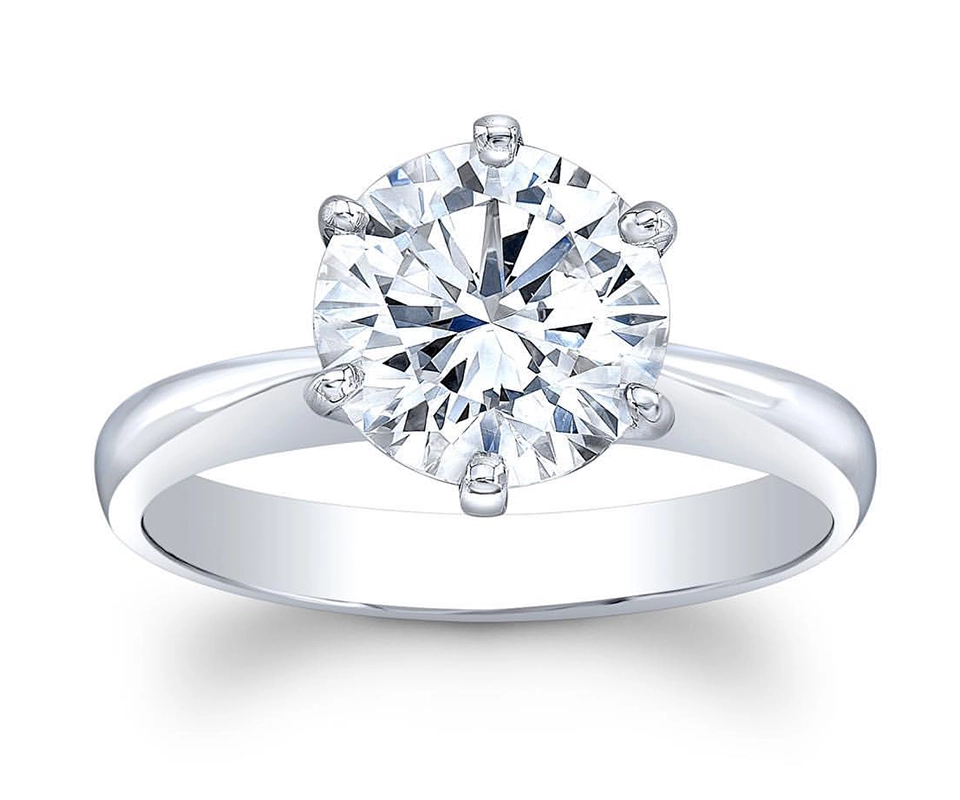 Round brilliant diamond solitaire ring with six-prong setting 