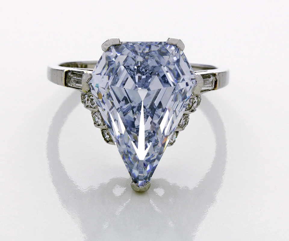 Fancy light blue kite-shaped diamond ring with V-shaped prongs