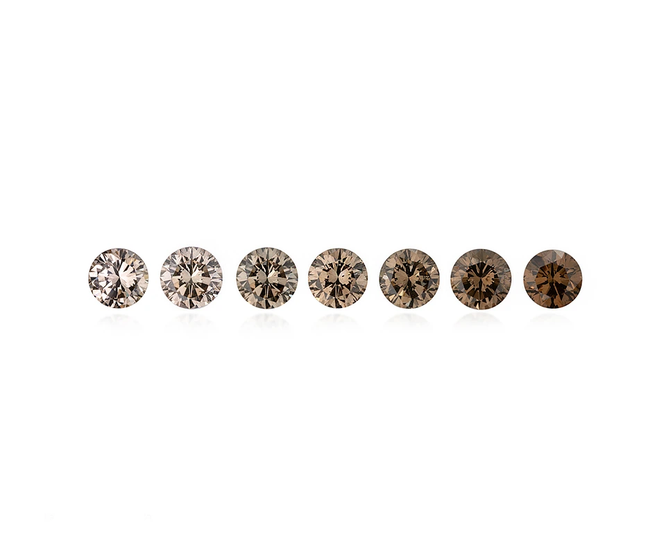 A color scale showing a range of brown to yellow brown Australian diamonds