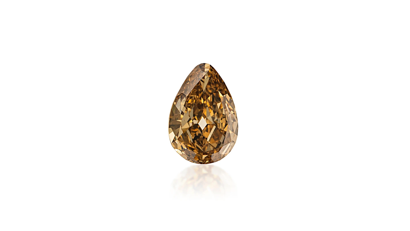Old mine pear shape Fancy Deep Brown Yellow diamond.