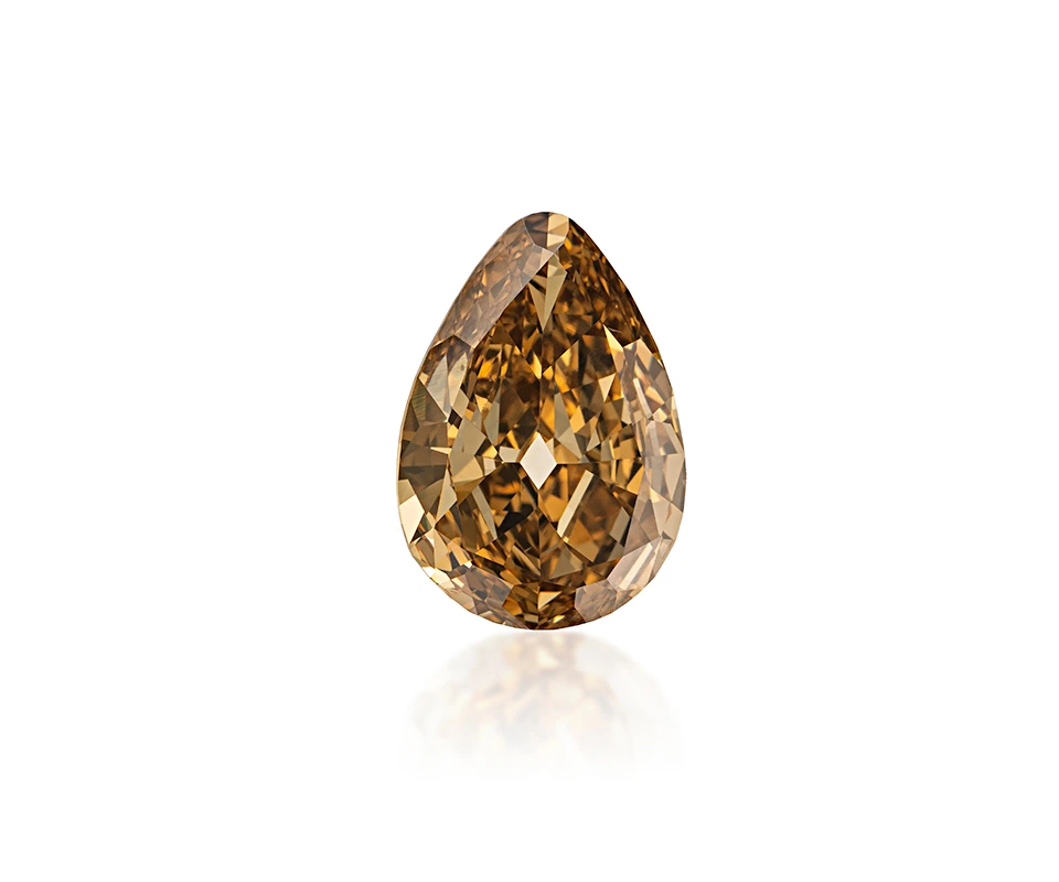 Old mine pear shape Fancy Deep Brown Yellow diamond.