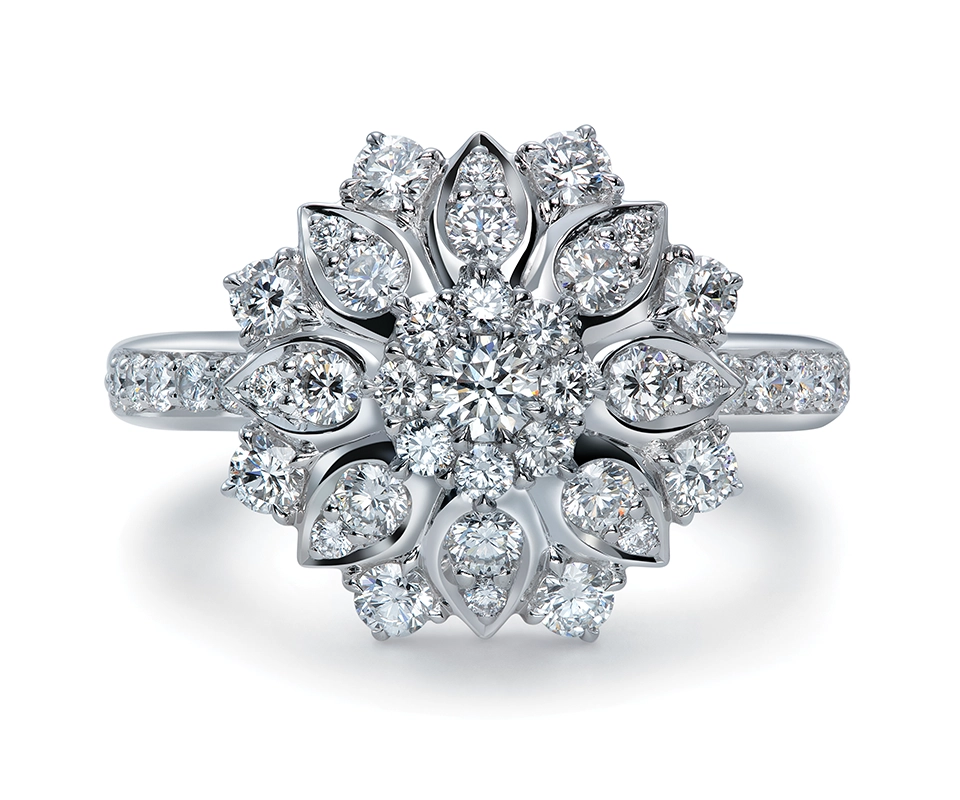 Flower motif diamond cluster ring in 18k white gold