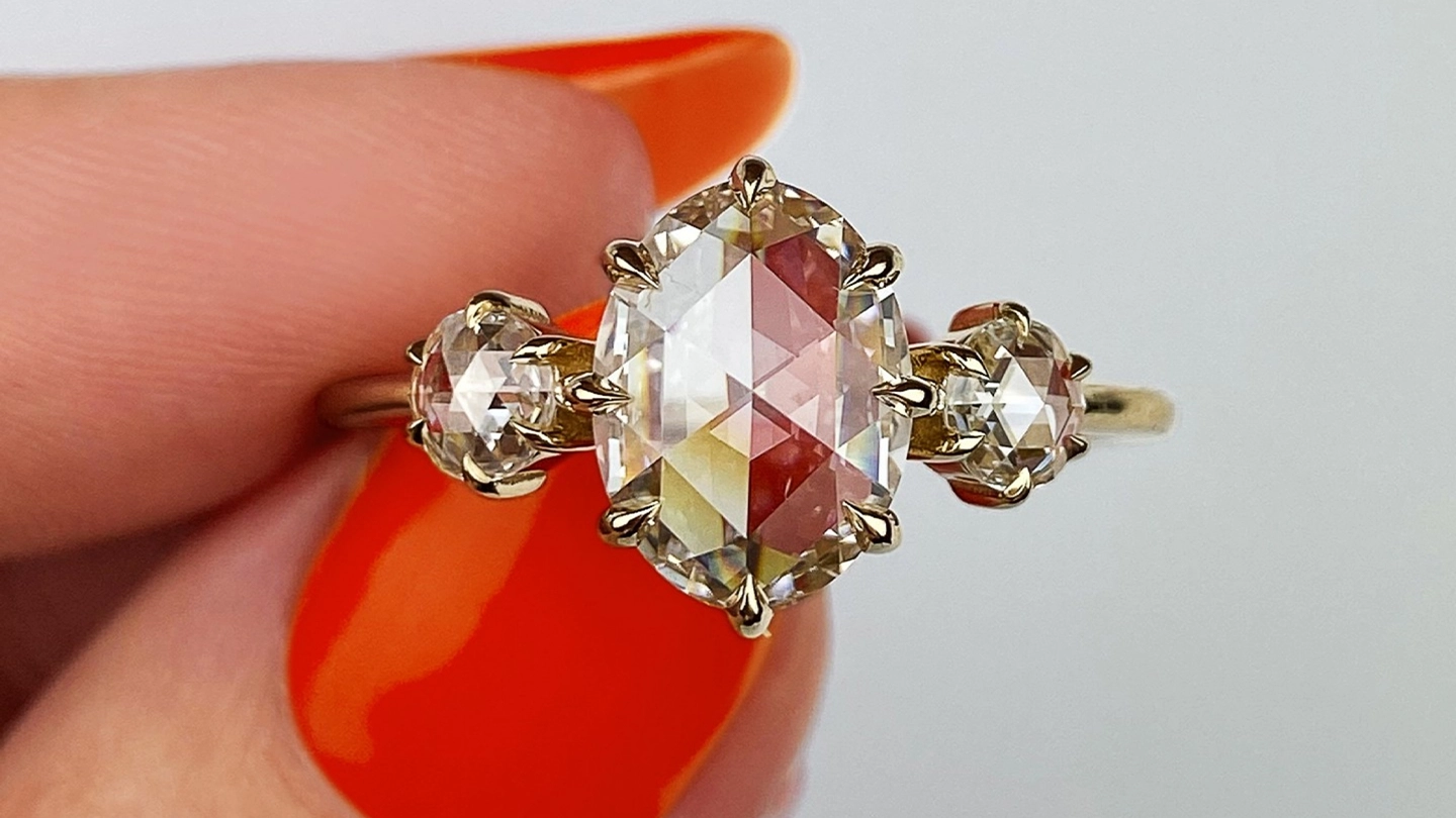 Three-stone engagement ring with rose cut diamonds
