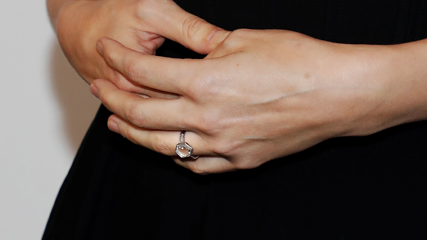 Hexagonal portrait cut diamond engagement ring worn by actress Rooney Mara