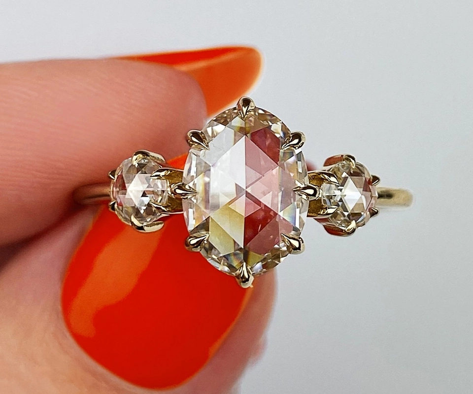 Three-stone engagement ring with rose cut diamonds