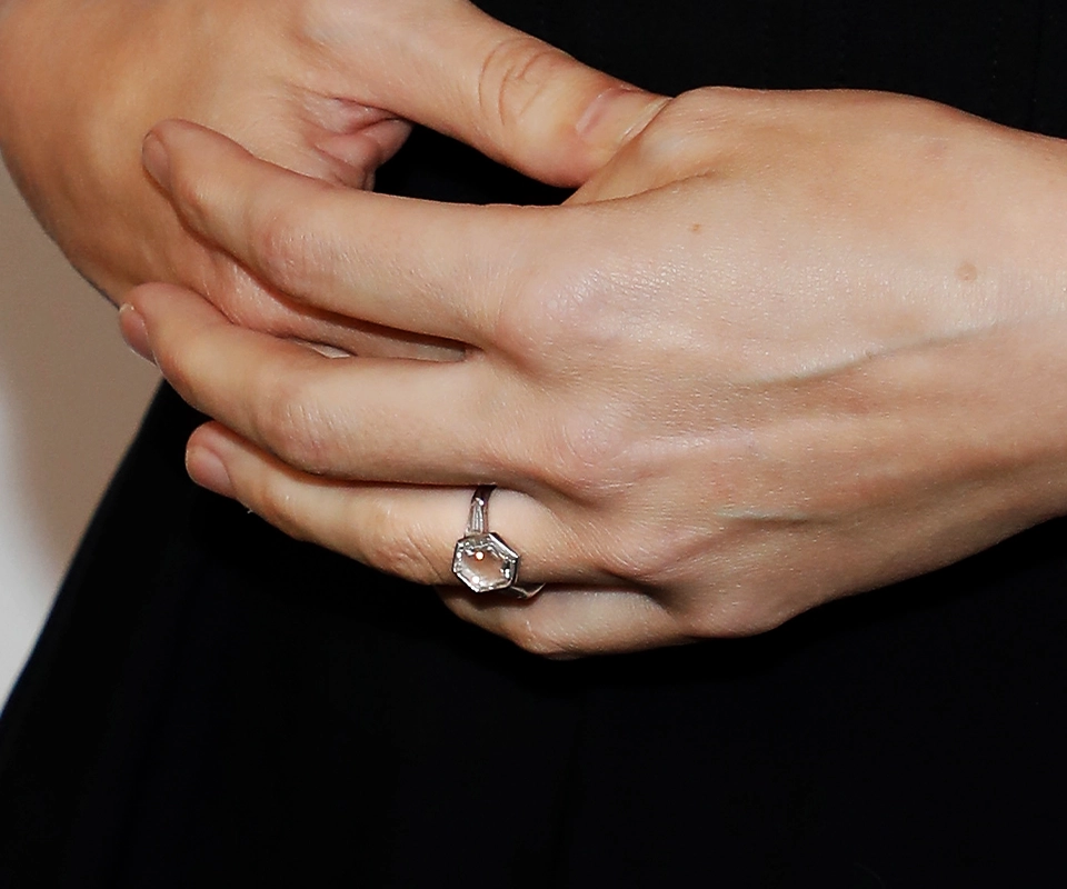 Hexagonal portrait cut diamond engagement ring worn by actress Rooney Mara