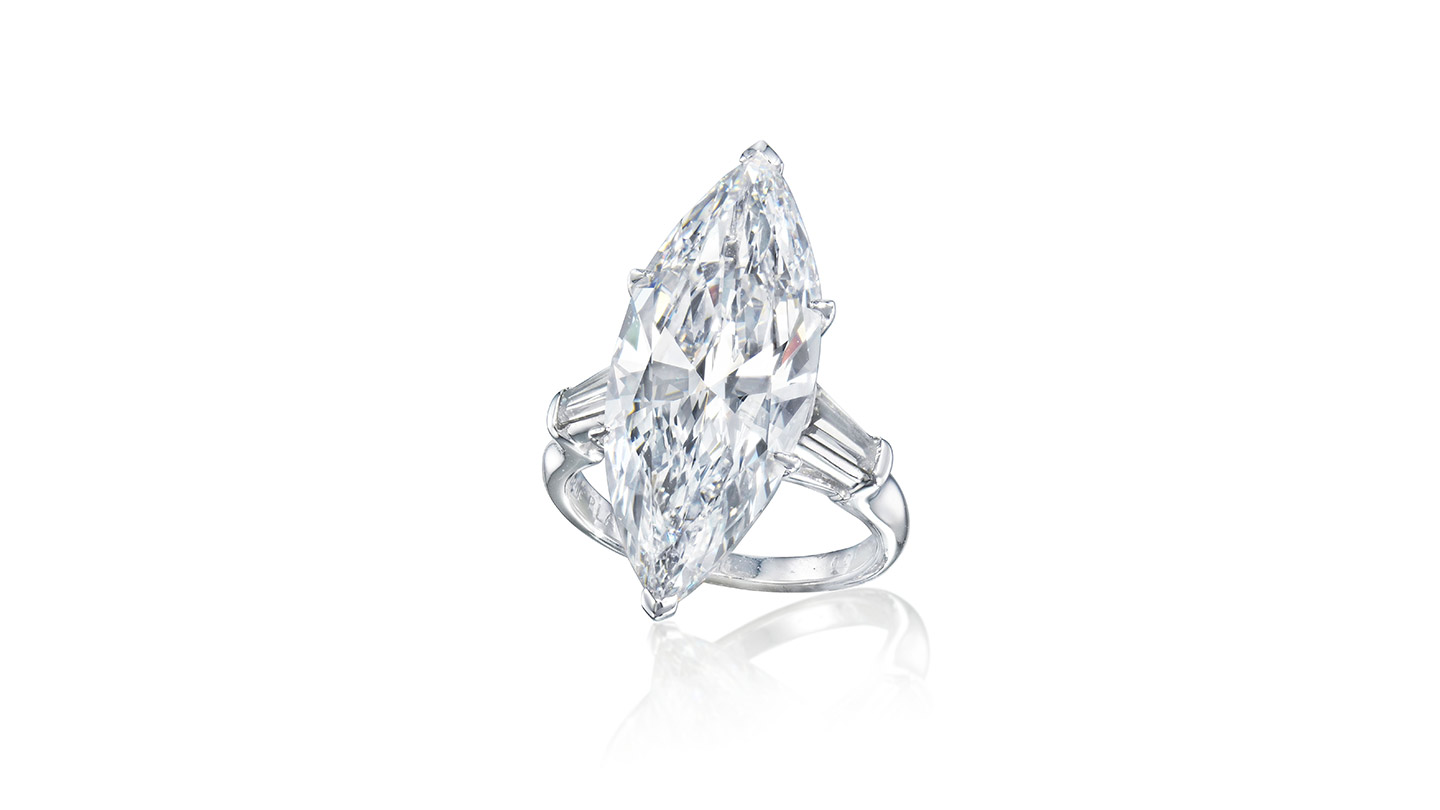 Ten carat marquise-cut diamond secured in six prong setting.