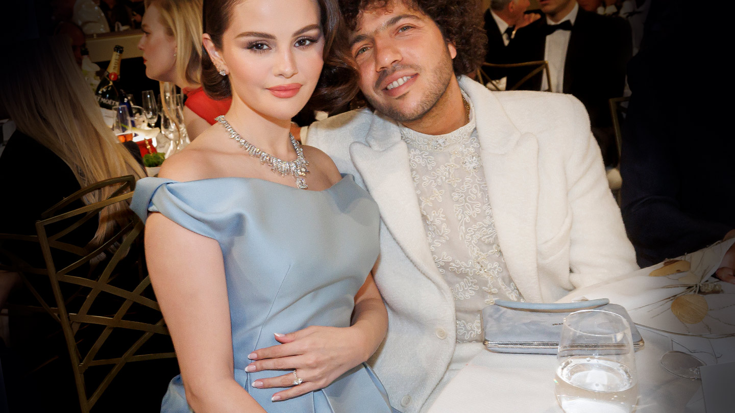 Selena Gomez wearing a marquise-cut diamond engagement ring on a pavé set yellow gold band at the Golden Globes